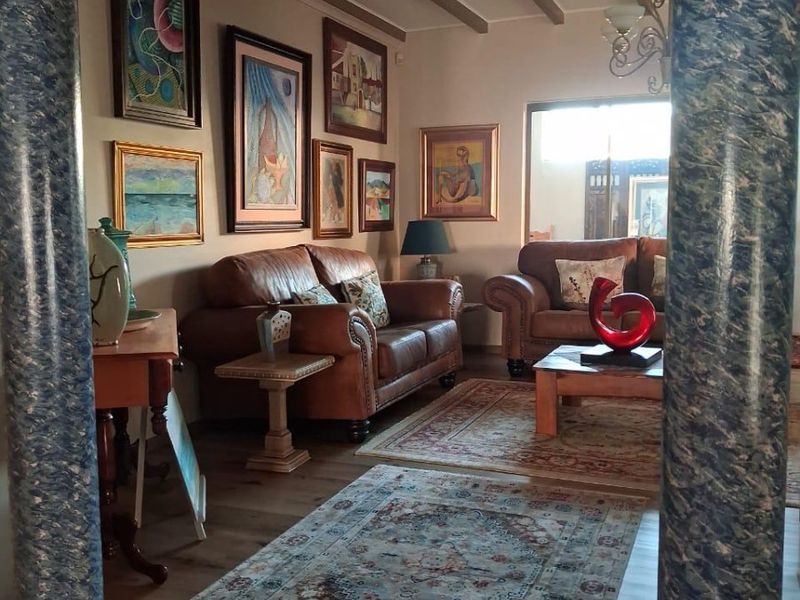 Elegant Coastal Residence with Exceptional Entertainment Spaces and Income Potential - Photo 10