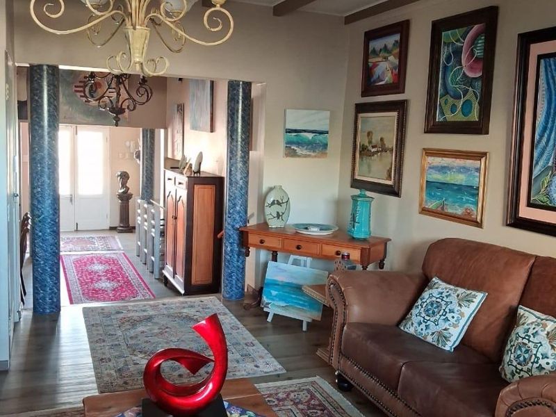 Elegant Coastal Residence with Exceptional Entertainment Spaces and Income Potential - Photo 9