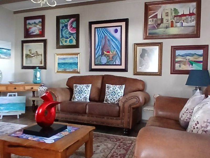 Elegant Coastal Residence with Exceptional Entertainment Spaces and Income Potential - Photo 7
