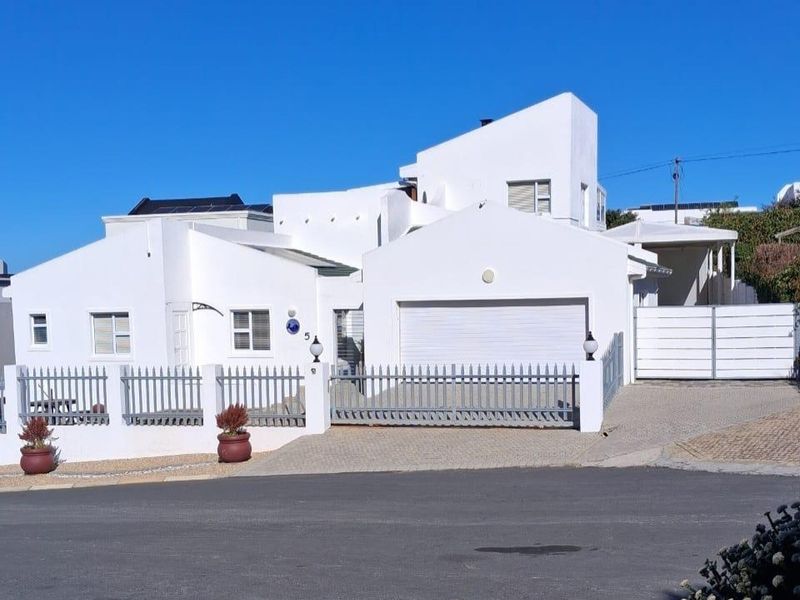 Elegant Coastal Residence with Exceptional Entertainment Spaces and Income Potential - Photo 3
