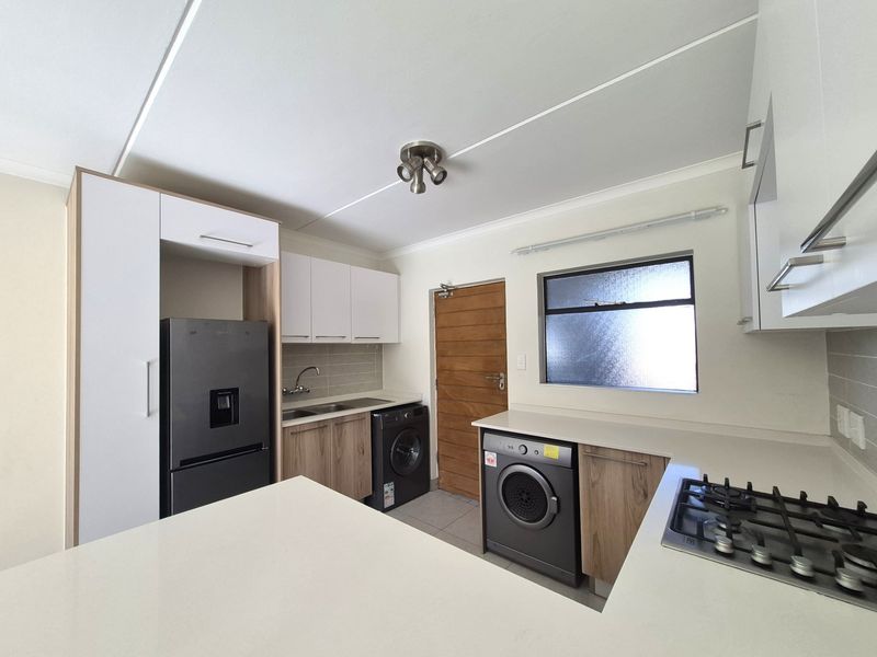 Modern Ground Floor Living with Private Garden in Sought-After Founders Hill - Photo 4