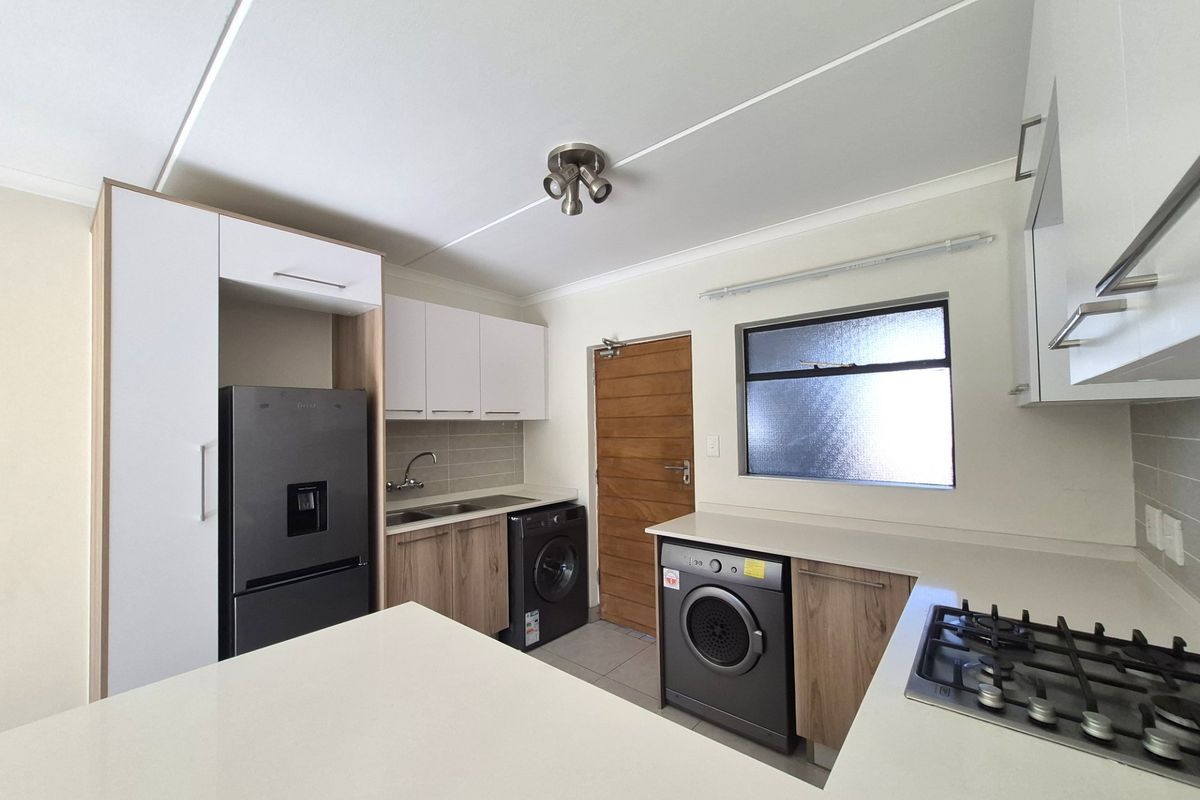 Modern Ground Floor Living with Private Garden in Sought-After Founders Hill - Photo 4