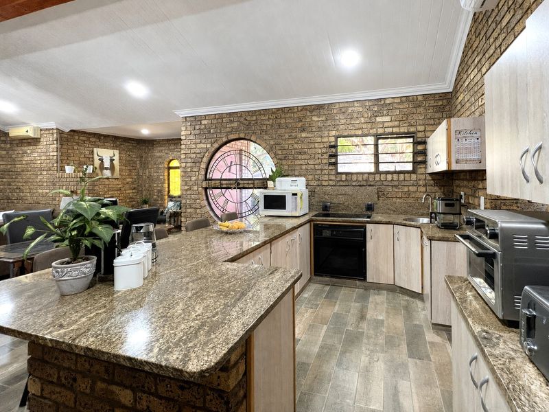 Thoughtfully Renovated Family Home Nestled in a Lush Indigenous Lowveld Garden - Photo 3