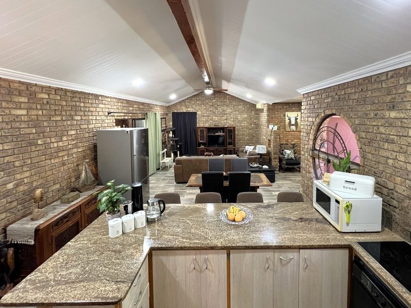 Thoughtfully Renovated Family Home Nestled in a Lush Indigenous Lowveld Garden - Photo 5