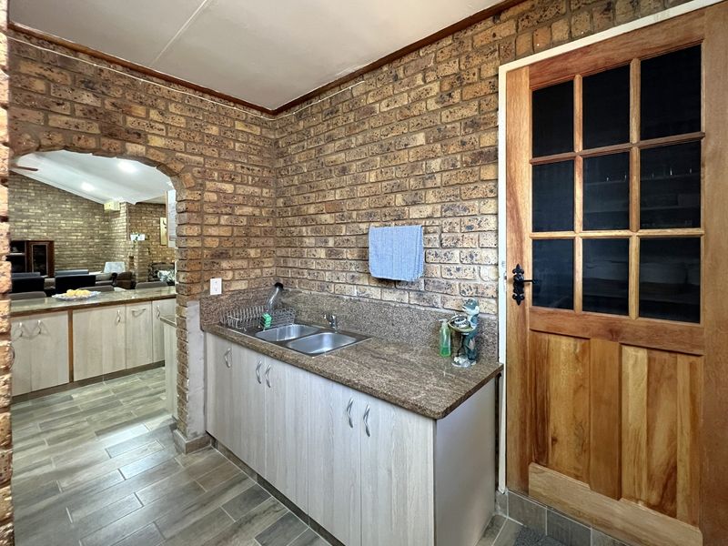Thoughtfully Renovated Family Home Nestled in a Lush Indigenous Lowveld Garden - Photo 6