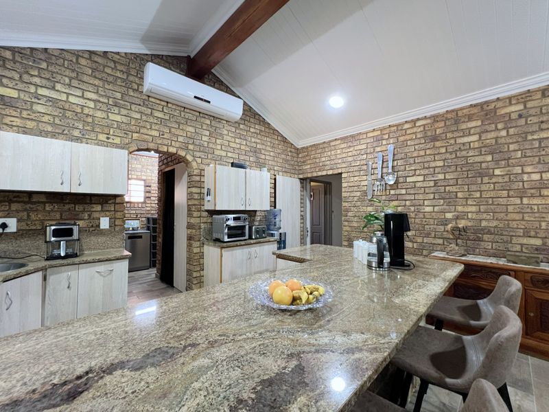 Thoughtfully Renovated Family Home Nestled in a Lush Indigenous Lowveld Garden - Photo 4