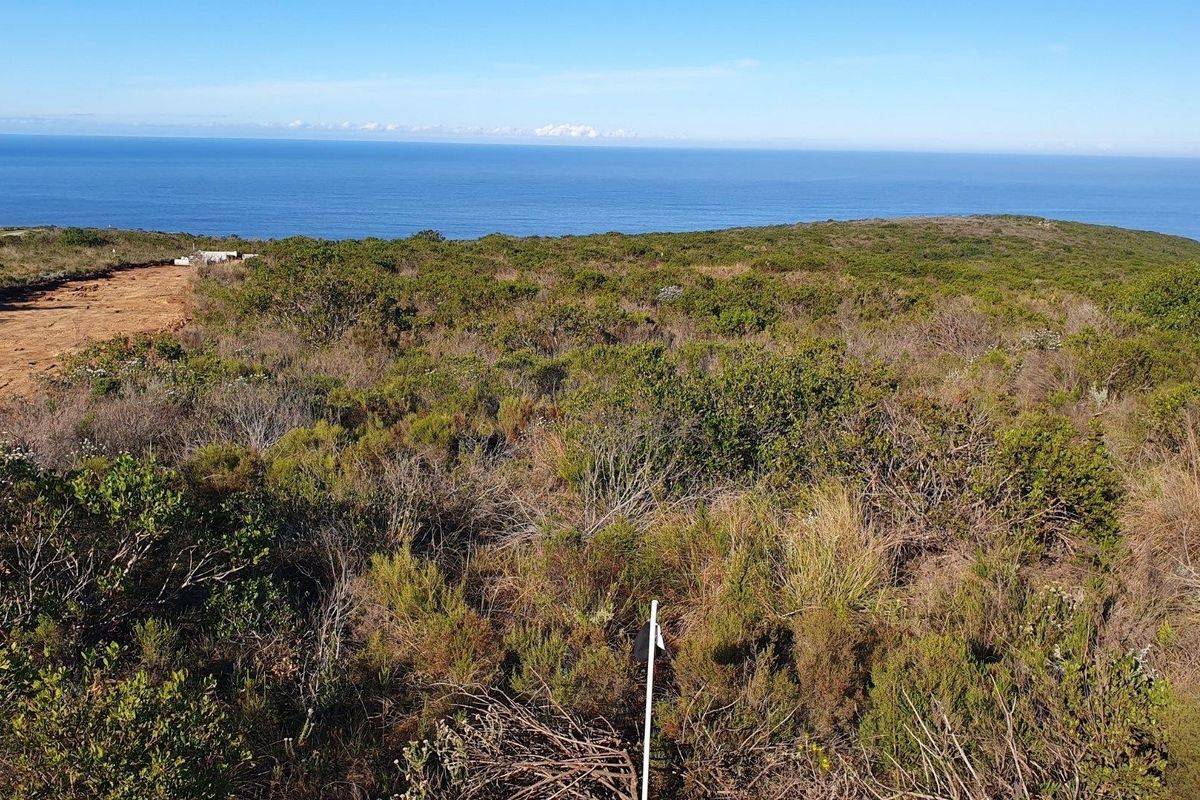 A scenic view of the coastal landscape and ocean from the vacant residential property.