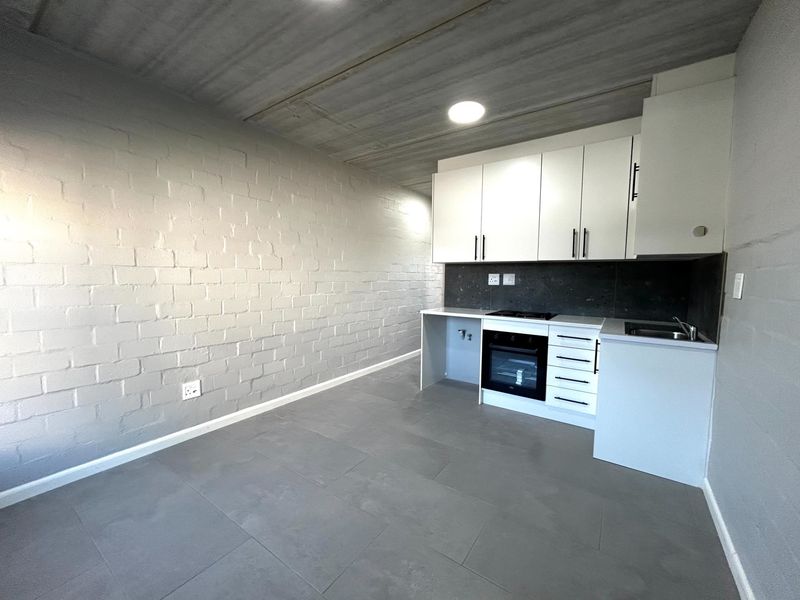 Stylish 1-Bedroom Apartment with Balcony and Secure Parking - Photo 1