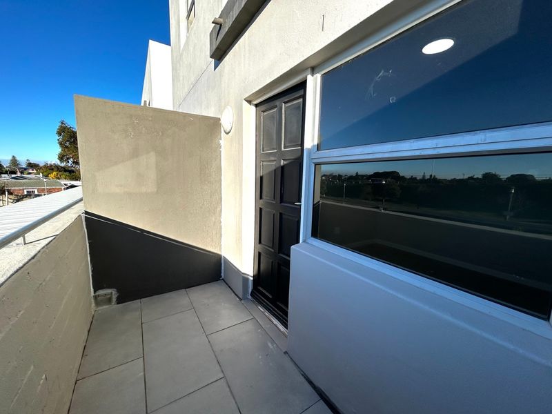 Stylish 1-Bedroom Apartment with Balcony and Secure Parking - Photo 7
