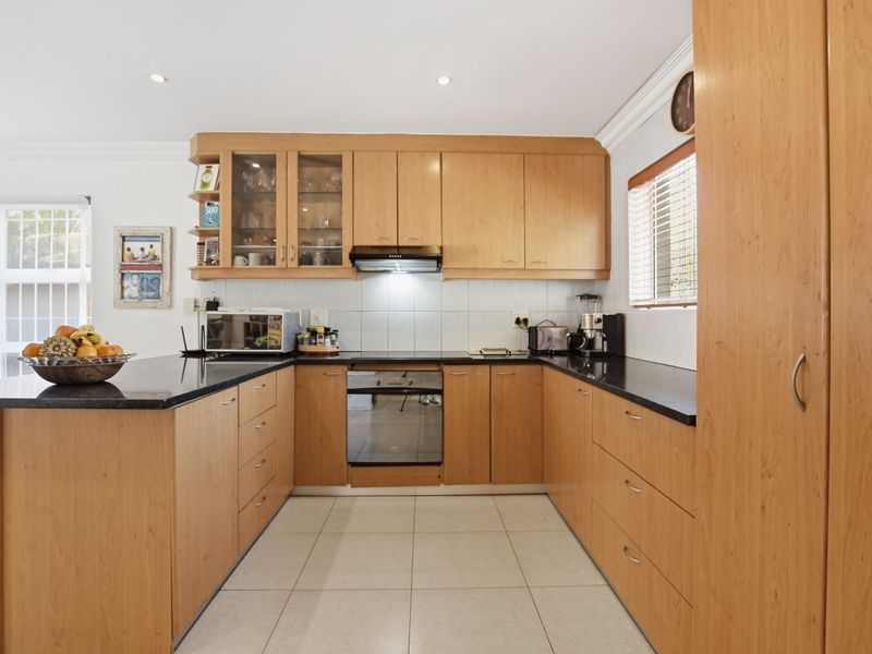 FOUR BEDROOM D/S FAMILY HOME WITH STUDY AND POOL IN PARKLANDS FOR SALE - Photo 6