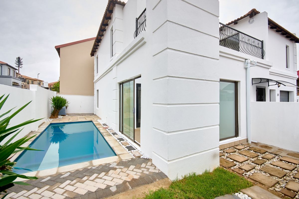 Modern Family Retreat | 3 Beds + Pool | Freehold in Halfway Gardens - Photo 2