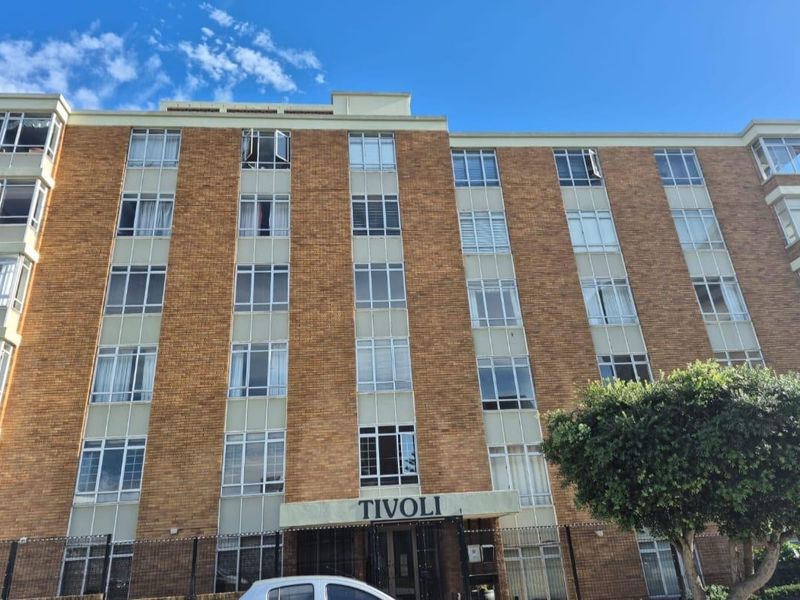 Front elevation of the Tivoli apartment building, featuring a classic brick facade and multiple levels of residential windows.