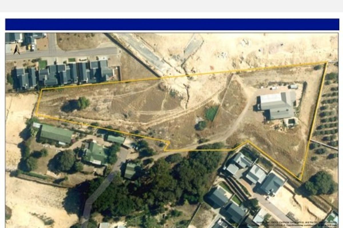 An aerial map view showing the property boundaries and existing structures on the plot.