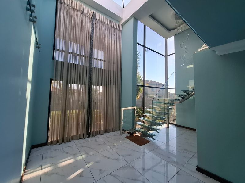 Spacious Double-Storey Family Home with Pool and Solar Power - Photo 10