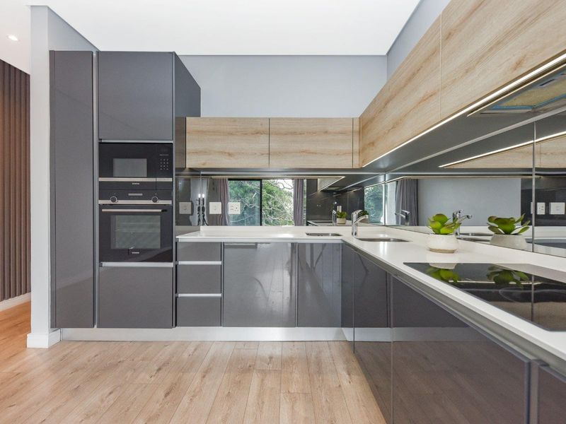 High-Design Luxury Meets Elite Urban Living: Impeccable 2-Bed, 2-Bath Haven at Tree Tops - Photo 3