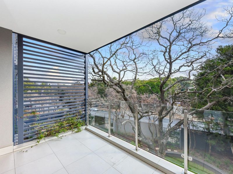 High-Design Luxury Meets Elite Urban Living: Impeccable 2-Bed, 2-Bath Haven at Tree Tops - Photo 8