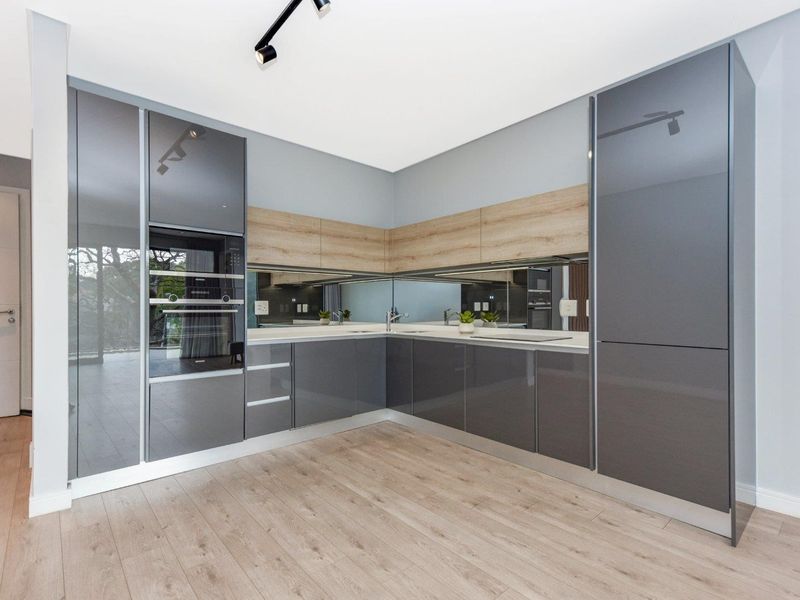 High-Design Luxury Meets Elite Urban Living: Impeccable 2-Bed, 2-Bath Haven at Tree Tops - Photo 2