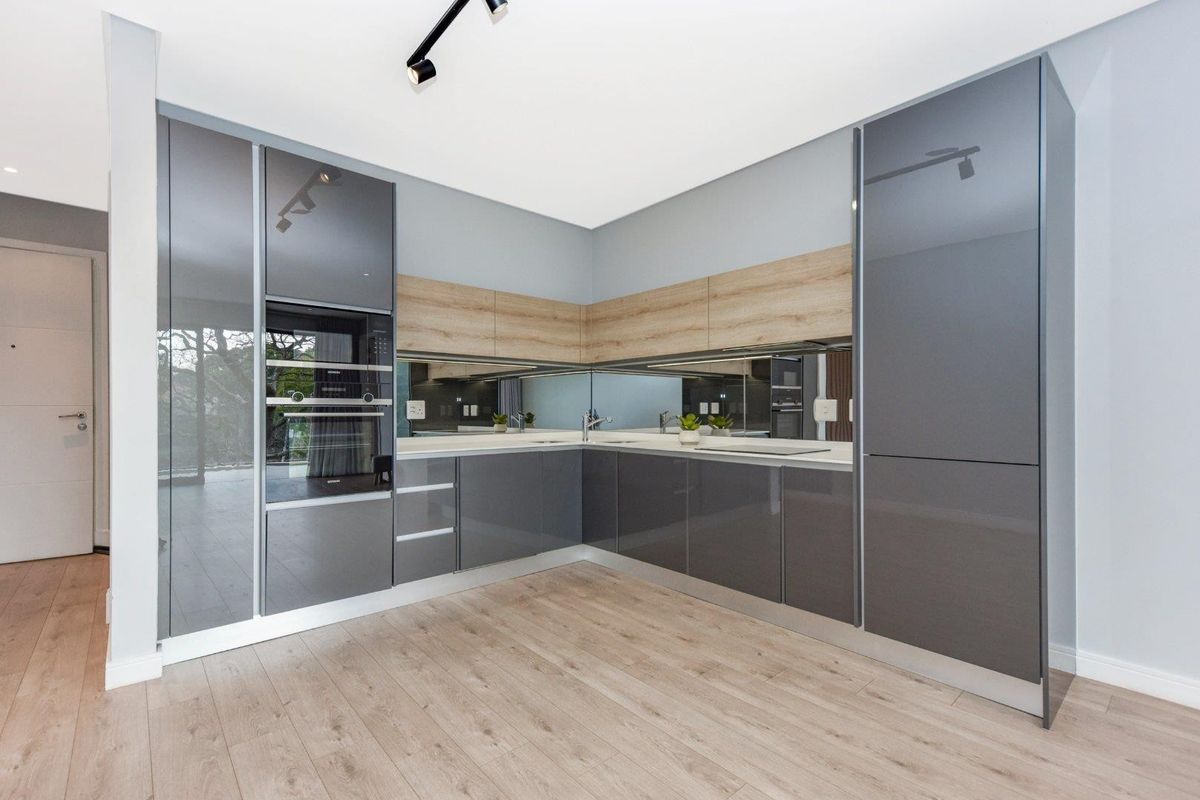 High-Design Luxury Meets Elite Urban Living: Impeccable 2-Bed, 2-Bath Haven at Tree Tops - Photo 2