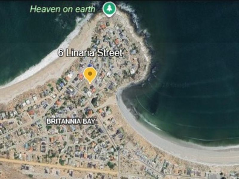 An aerial satellite view of the coastal residential area in Britannia Bay, highlighting the property location and surrounding coastline.