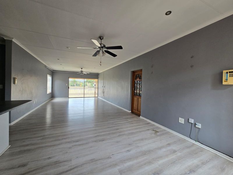 Stylish Family Living with Extra Space, Pet-Friendly Garden and Built-In Braai - Photo 9