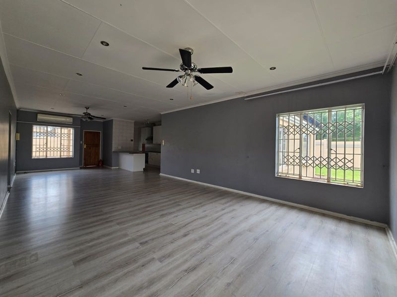 Stylish Family Living with Extra Space, Pet-Friendly Garden and Built-In Braai - Photo 7