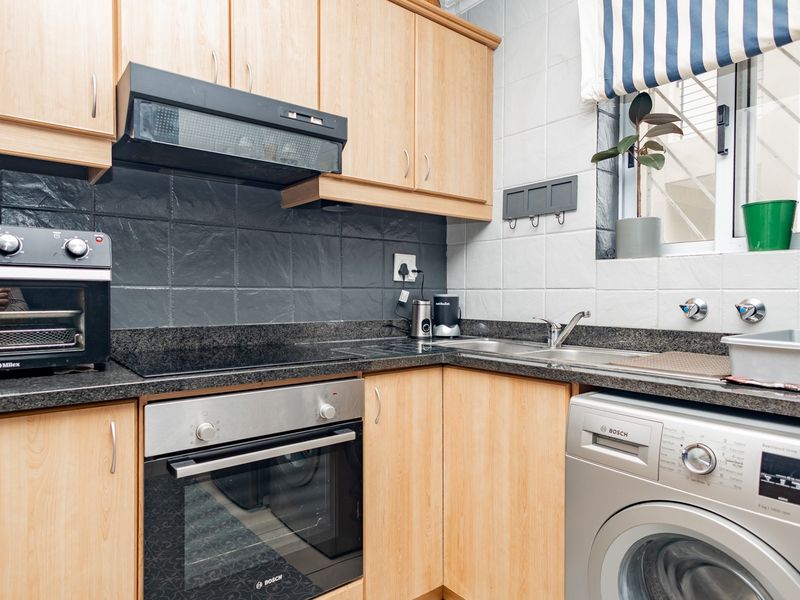 The Ultimate Waterfront Lifestyle: 2-Bed Modern Gem with 2 Parking Bays! - Photo 8
