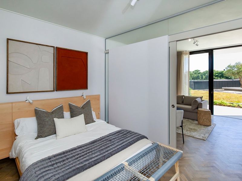 Experience luxury urban living in this beautifully appointed Ground floor fully furnished 1-bedroom - Photo 9