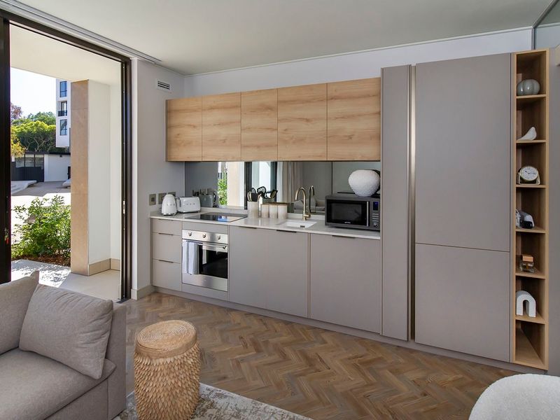 Experience luxury urban living in this beautifully appointed Ground floor fully furnished 1-bedroom - Photo 3