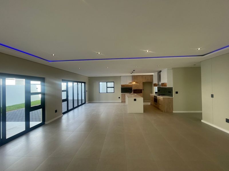 Modern Family Living in a Secure Enclave - Photo 2