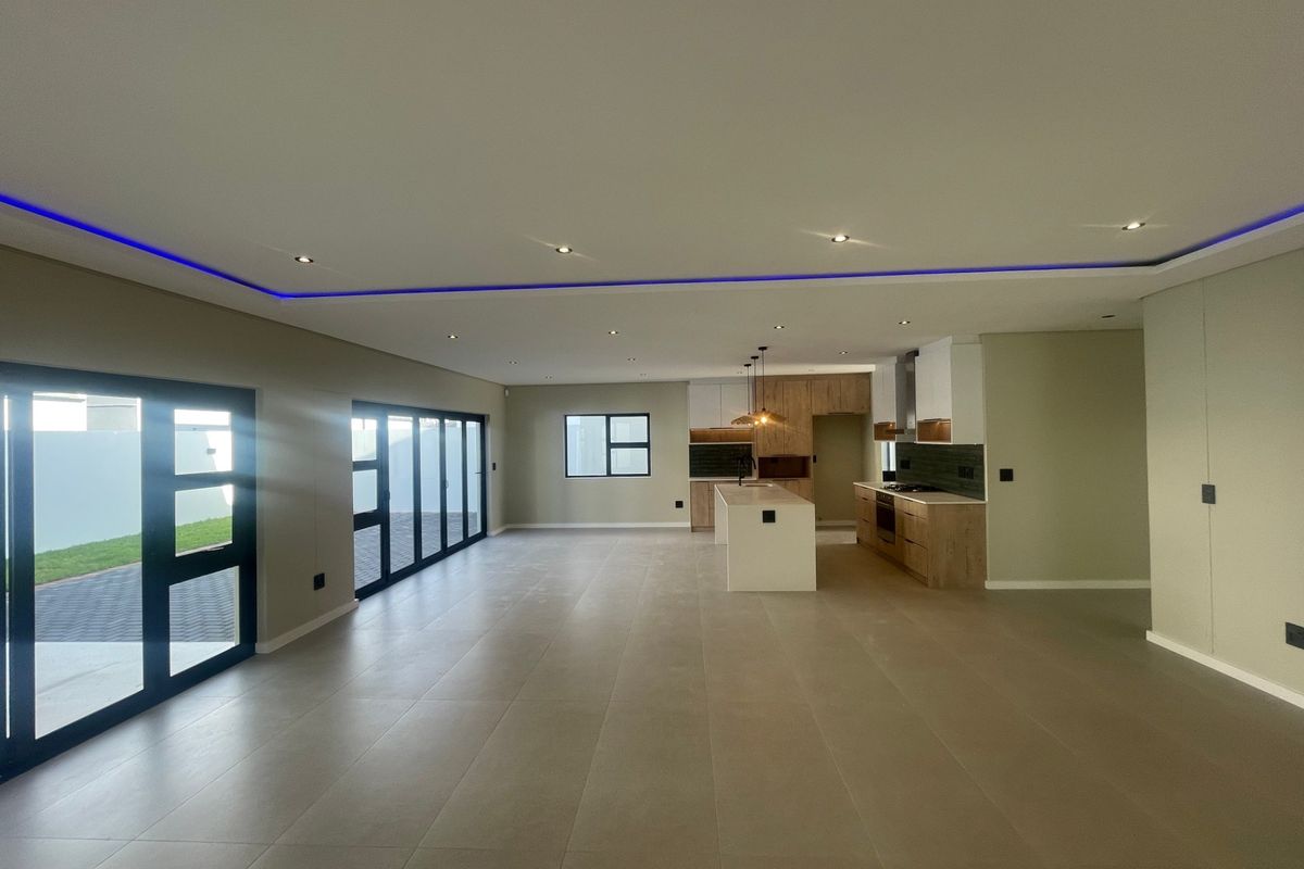Modern Family Living in a Secure Enclave - Photo 2