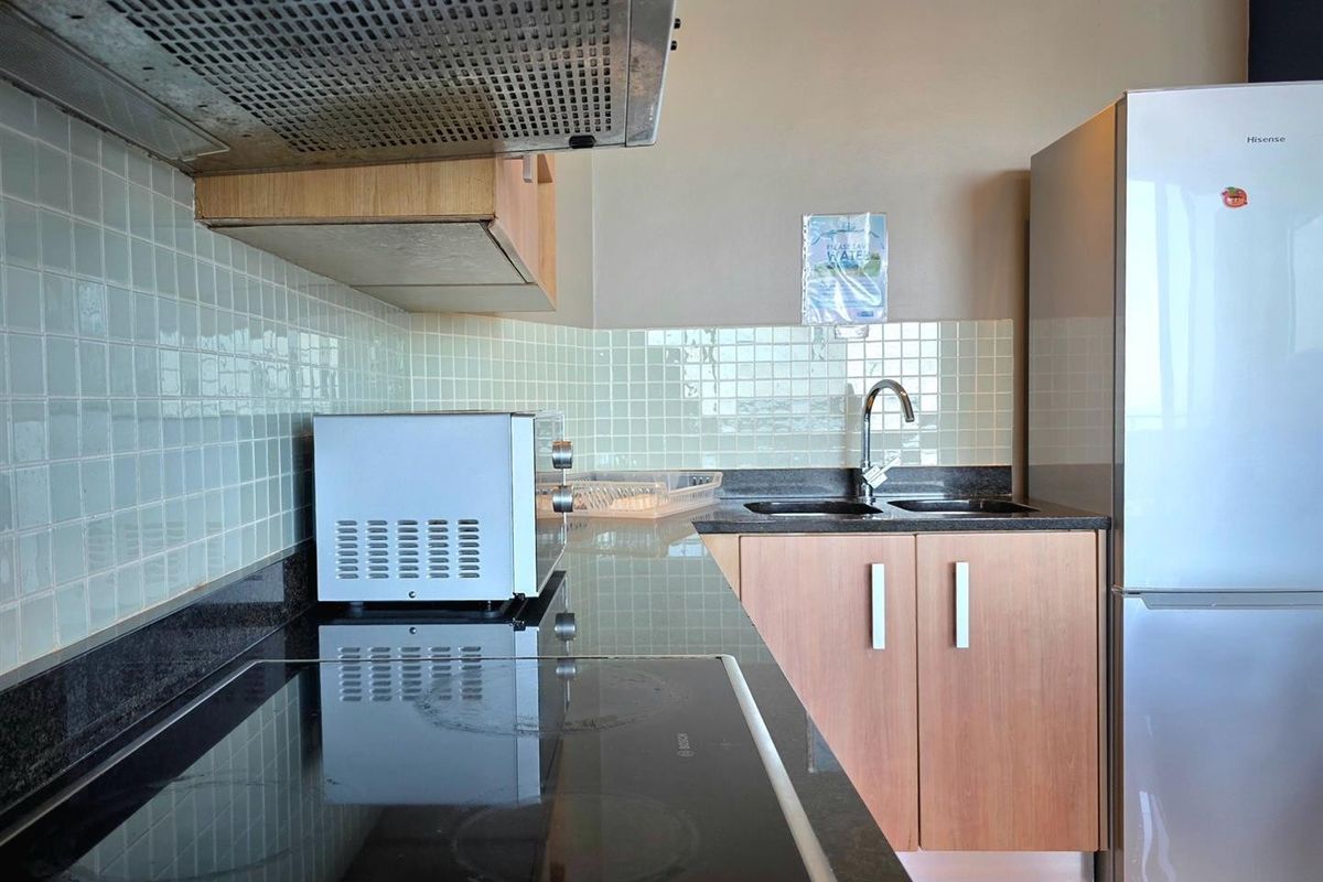 2 BED FULLY FURNISHED BEACHFRONT APARTMENT - Photo 3