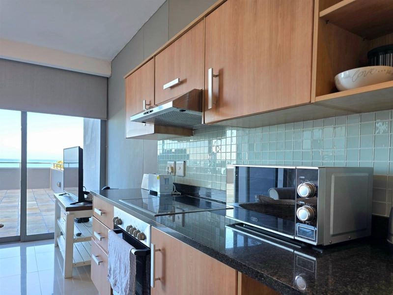 2 BED FULLY FURNISHED BEACHFRONT APARTMENT - Photo 4