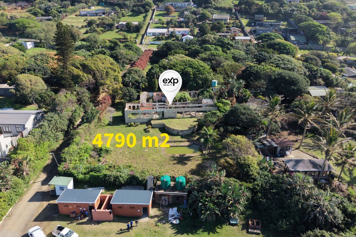 Aerial view of a large 4790m2 commercial property featuring a dilapidated building structure, an unmaintained pool, and extensive surrounding grounds.