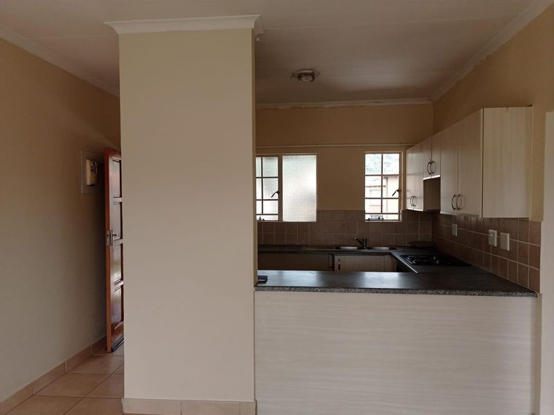 Life is good at the top with this stylish 2 bed 1 bath apartment for sale in Meredale - Photo 3
