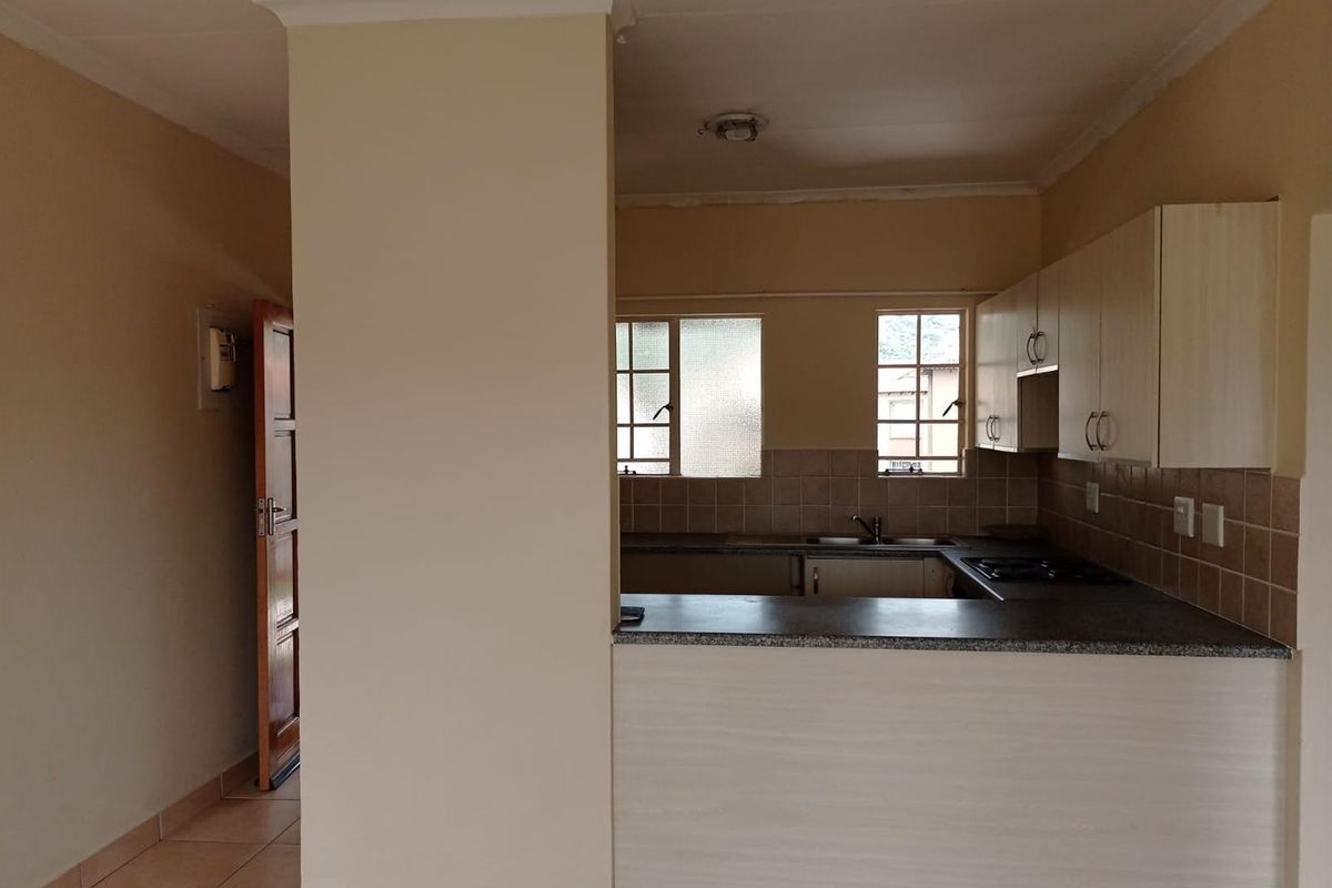 Life is good at the top with this stylish 2 bed 1 bath apartment for sale in Meredale - Photo 3