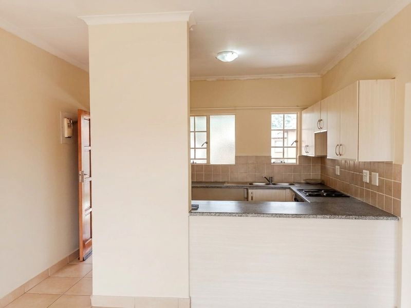 Life is good at the top with this stylish 2 bed 1 bath apartment for sale in Meredale - Photo 4