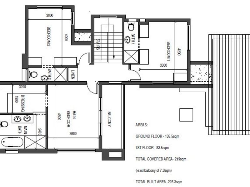 Architectural floor plan showing the layout of the first floor, including three bedrooms, bathrooms, and a balcony.