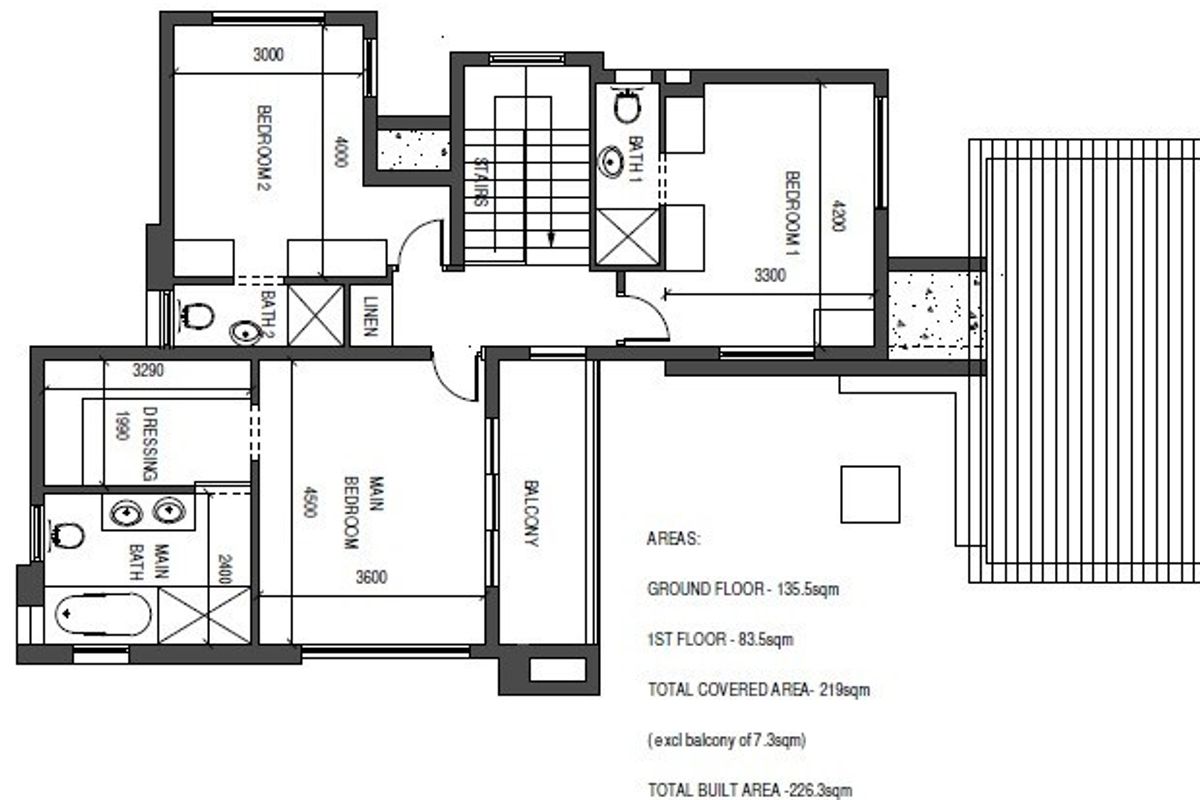 Architectural floor plan showing the layout of the first floor, including three bedrooms, bathrooms, and a balcony.