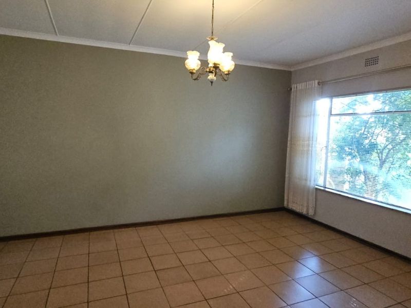 Neat family home in well sought after area.  Tranquil garden with sprinkler system - Photo 6