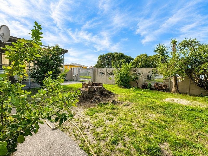 Solid Family Home with Endless Potential | Flatlet Opportunity | Double Garage | Parking for 6 - Photo 6