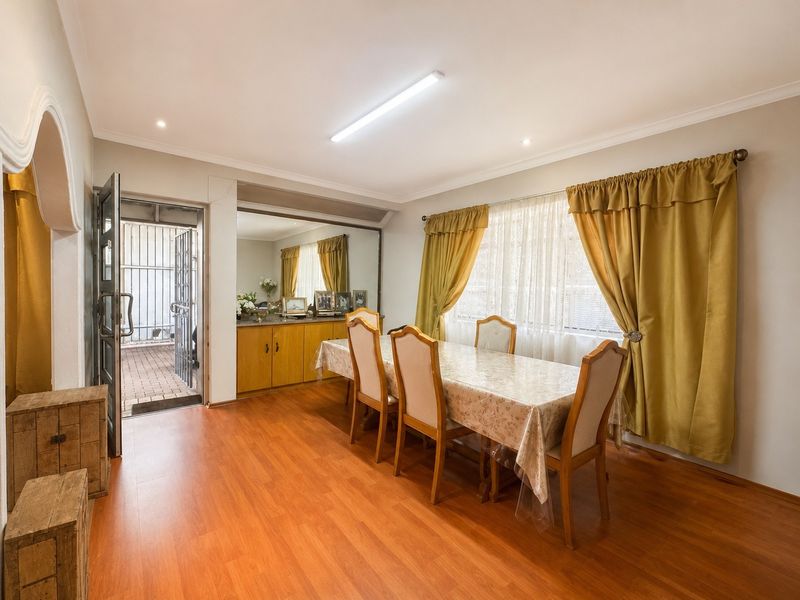 Solid Family Home with Endless Potential | Flatlet Opportunity | Double Garage | Parking for 6 - Photo 10