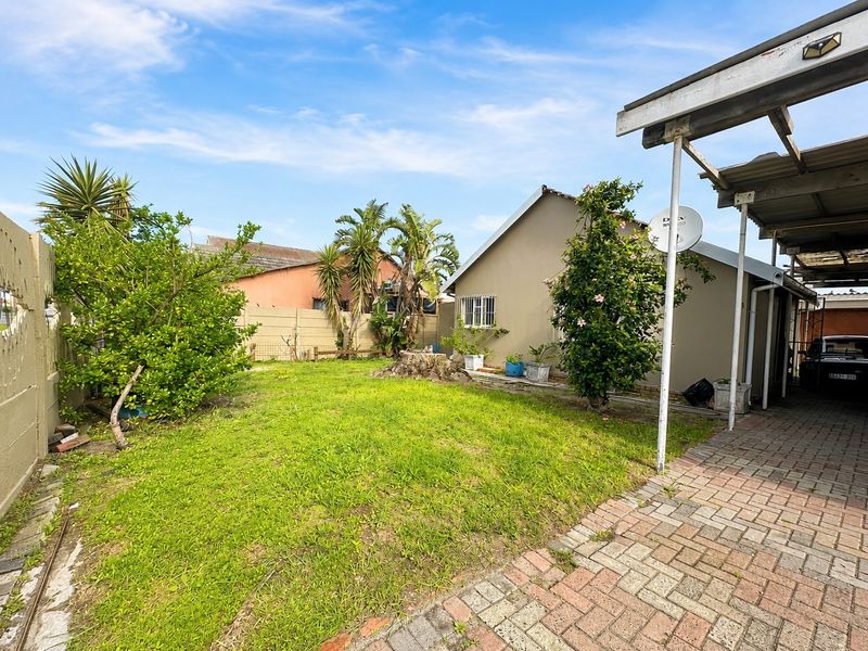 Solid Family Home with Endless Potential | Flatlet Opportunity | Double Garage | Parking for 6 - Photo 4