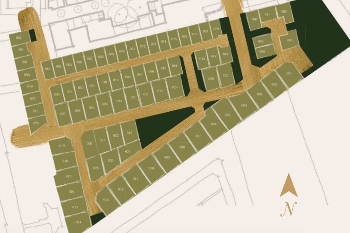 A detailed site plan showing the layout of residential plots and internal road infrastructure for the development.