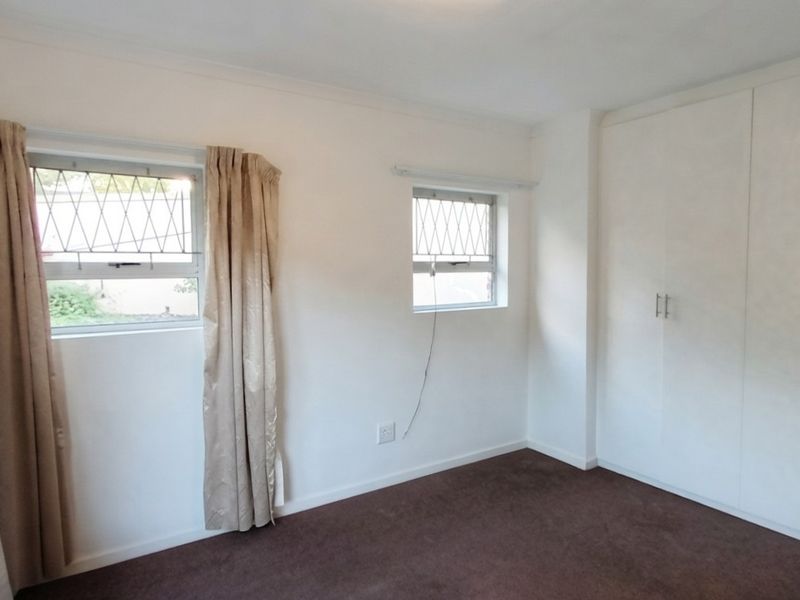 Secure, Comfortable Living with a Beautiful Established Garden in Beacon Bay - Photo 9