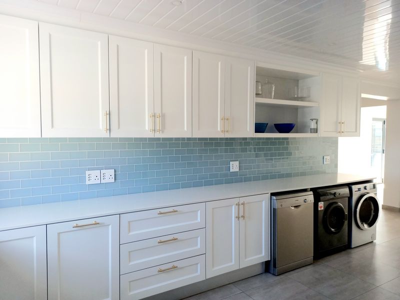 Luxury Family Home with Lagoon Views and Investment Potential - Photo 8