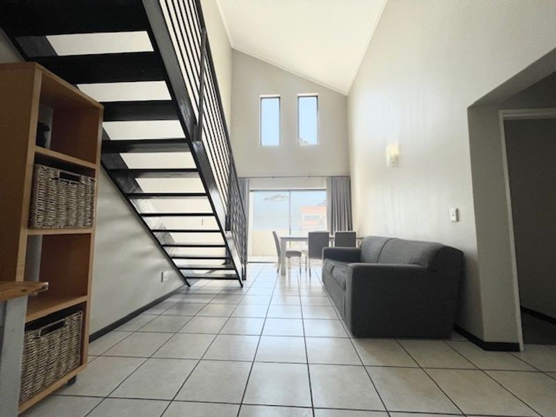 Gorgeous loft-style semi-furnished 2 bed 2 bath with amazing views - Photo 1