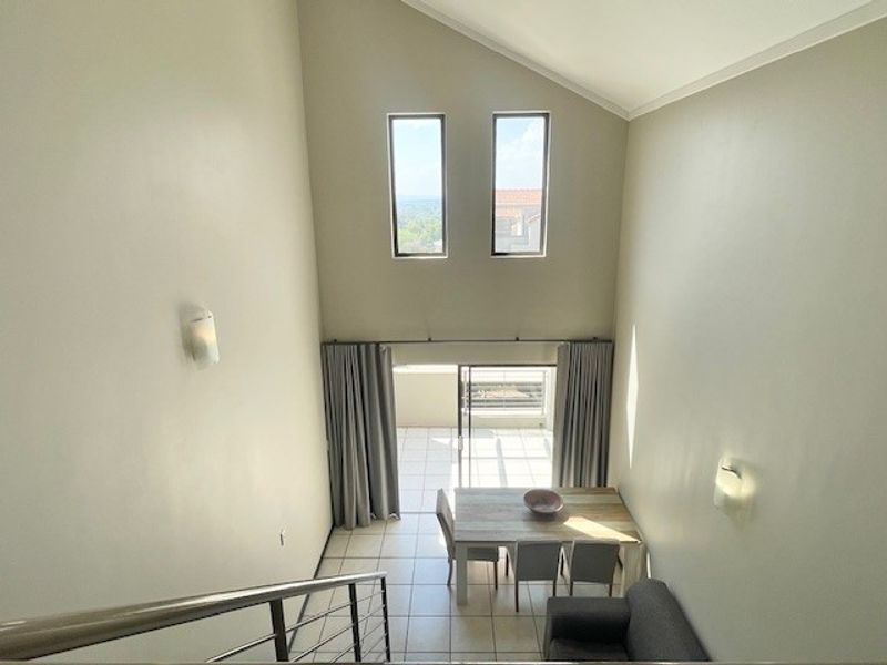 Gorgeous loft-style semi-furnished 2 bed 2 bath with amazing views - Photo 6