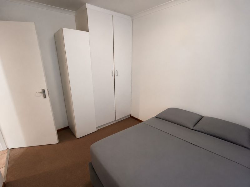 Two Bedroom House with Spacious Yard and Garage - Photo 9