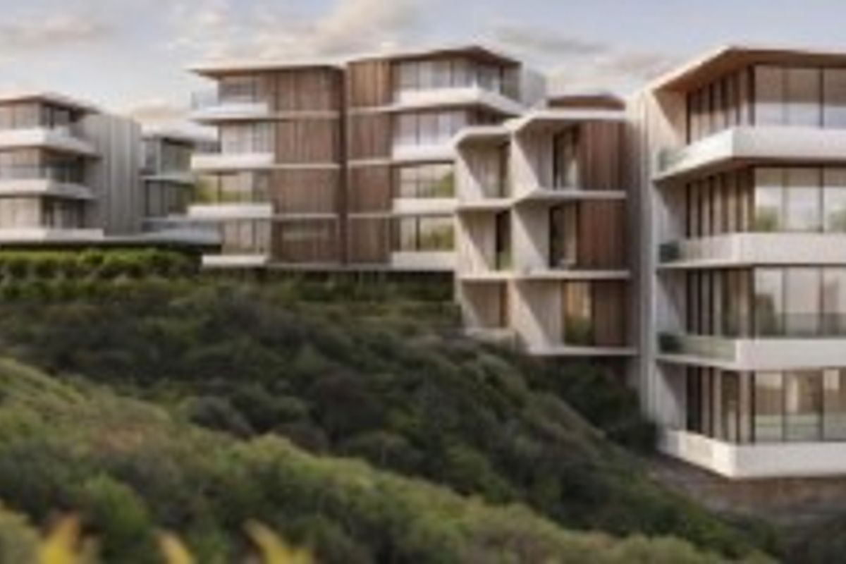 An aerial perspective of a modern multi-story residential development featuring timber-clad facades and expansive balconies set within a landscaped hillside environment.