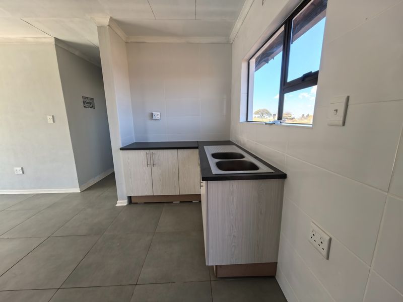 Modern 3-Bedroom Home in Sunnyridge - Ideal for First-Time Buyers or Investors - Photo 4